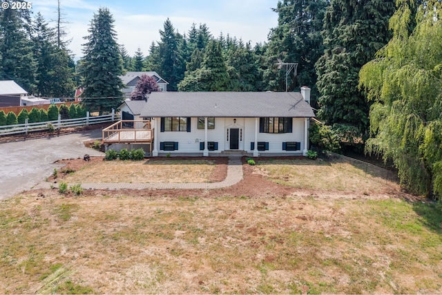 6195 Pear Tree Ln SE, Salem, OR 97317 - bi-level home with a chimney, asphalt driveway, and a deck