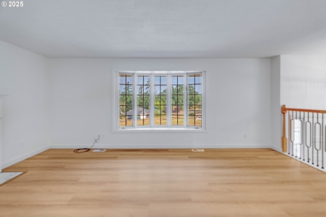 6195 Pear Tree Ln SE, Salem, OR 97317 - unfurnished room featuring baseboards and light wood-type flooring
