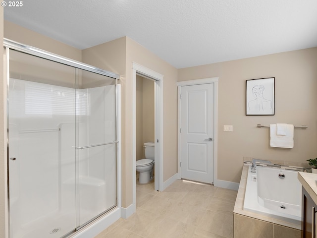 bathroom featuring a garden tub, toilet, a stall shower, a textured ceiling, and baseboards