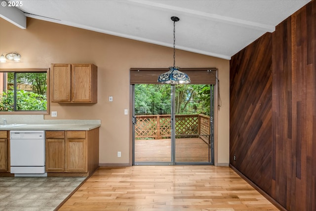 761 Foothill Dr, Eugene, OR 97405 - kitchen with white dishwasher, plenty of natural light, light countertops, and pendant lighting