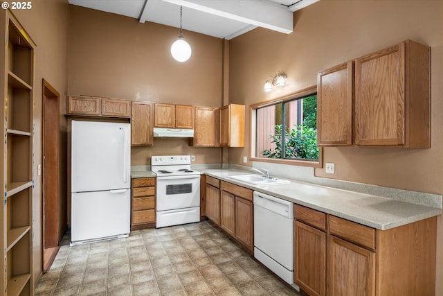 761 Foothill Dr, Eugene, OR 97405 - kitchen with white appliances, light countertops, under cabinet range hood, pendant lighting, and a towering ceiling