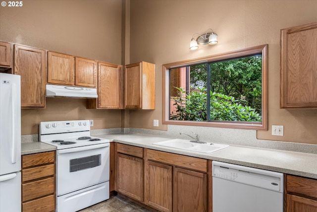 761 Foothill Dr, Eugene, OR 97405 - kitchen featuring white appliances, under cabinet range hood, and light countertops