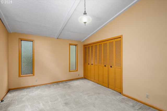 761 Foothill Dr, Eugene, OR 97405 - unfurnished bedroom with carpet, lofted ceiling, a closet, and a textured ceiling