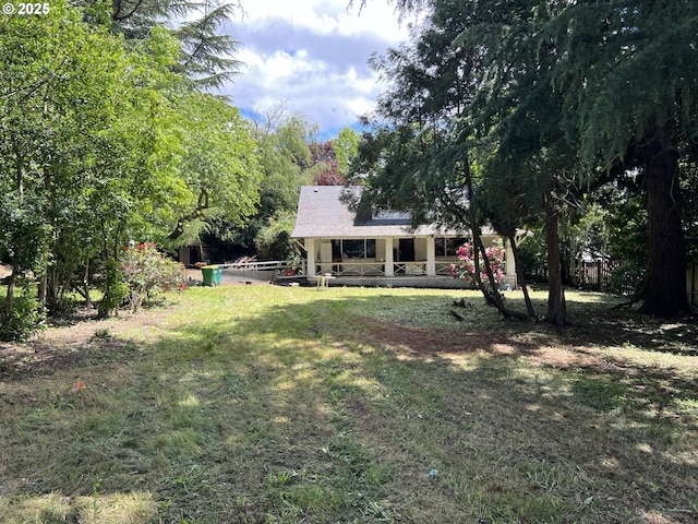 8270 SW Sorrento Rd, Beaverton, OR 97008 - view of green lawn featuring covered porch