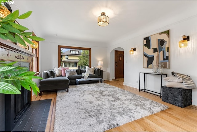 4004 N Montana Ave, Portland, OR 97227 - living room with arched walkways and wood finished floors