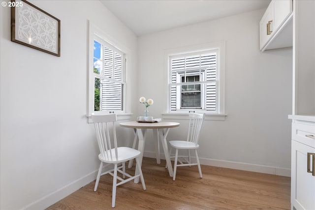 4004 N Montana Ave, Portland, OR 97227 - dining room featuring light wood-style floors and baseboards