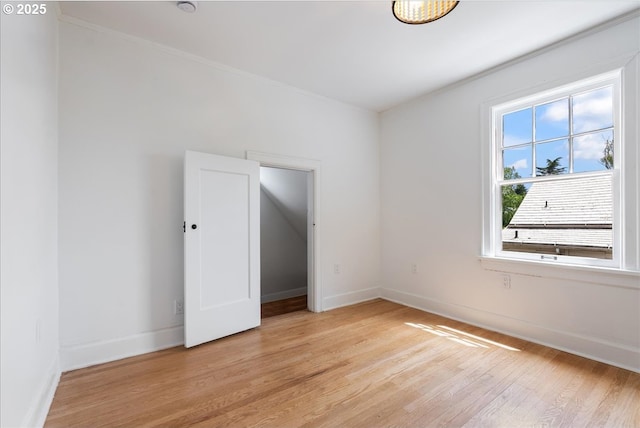 4004 N Montana Ave, Portland, OR 97227 - empty room with ornamental molding and light wood-style flooring