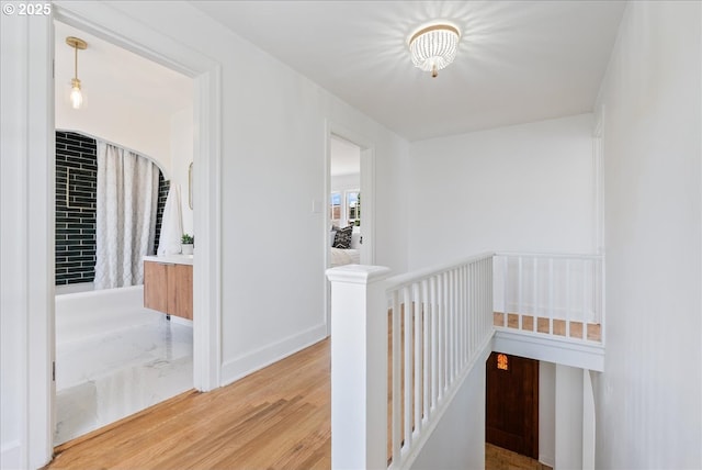 4004 N Montana Ave, Portland, OR 97227 - hall featuring an upstairs landing and light wood-style floors