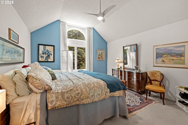 16165 NW Blueridge Dr, Beaverton, OR 97006 - carpeted bedroom featuring vaulted ceiling, a textured ceiling, and ceiling fan