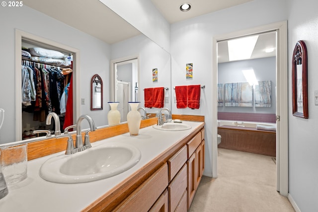 16165 NW Blueridge Dr, Beaverton, OR 97006 - full bath featuring double vanity, a bath, and a walk in closet