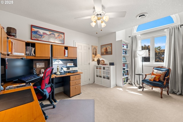 16165 NW Blueridge Dr, Beaverton, OR 97006 - home office featuring a ceiling fan, light colored carpet, and a textured ceiling