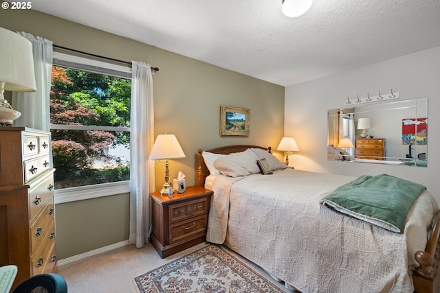 16165 NW Blueridge Dr, Beaverton, OR 97006 - carpeted bedroom featuring baseboards and a textured ceiling