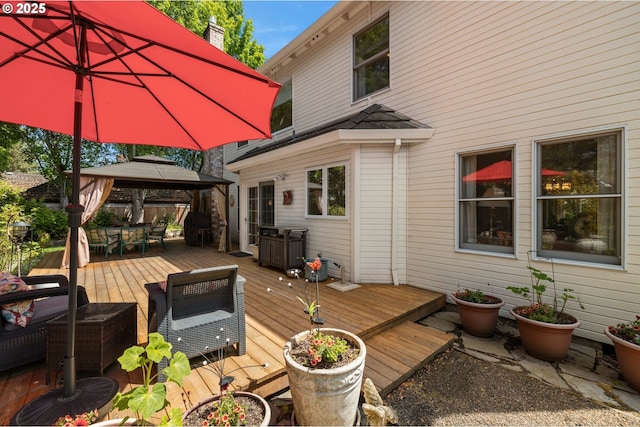 16165 NW Blueridge Dr, Beaverton, OR 97006 - wooden terrace with a gazebo and outdoor dining space