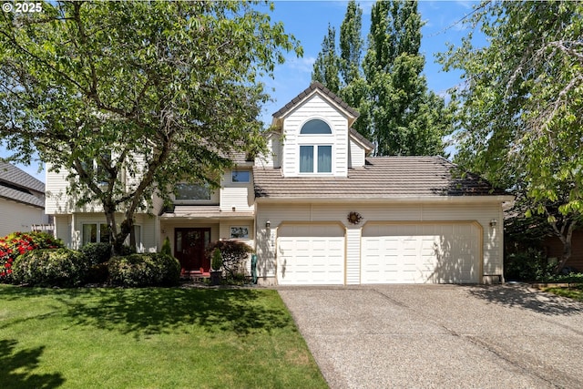 16165 NW Blueridge Dr, Beaverton, OR 97006 - view of front of house with driveway, a front yard, and an attached garage