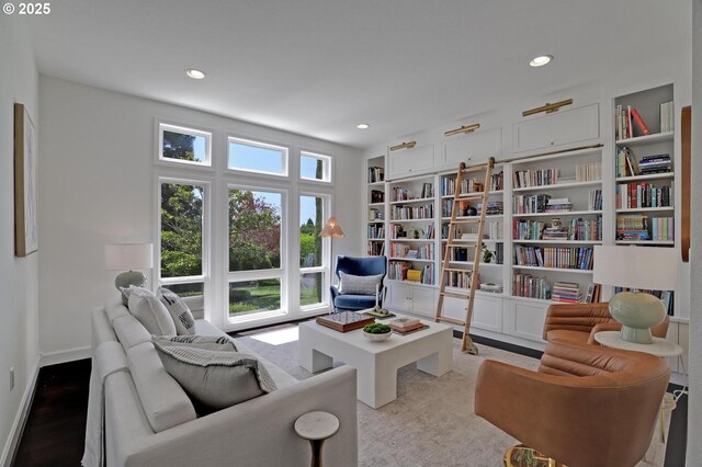 living area featuring recessed lighting and built in features
