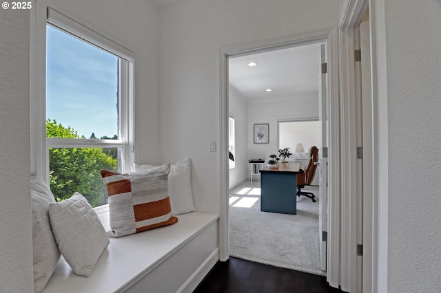 hall featuring a desk, dark wood-style floors, recessed lighting, and ornamental molding