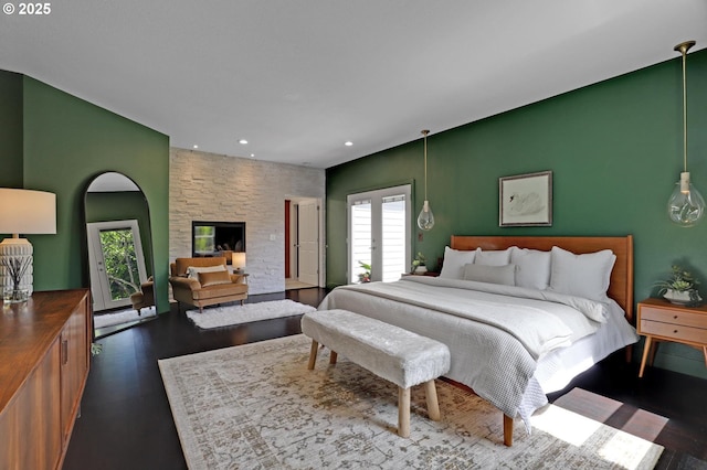 bedroom featuring dark wood-style floors and recessed lighting