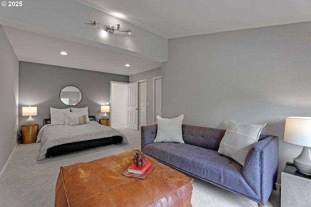 carpeted bedroom with baseboards, a closet, and recessed lighting