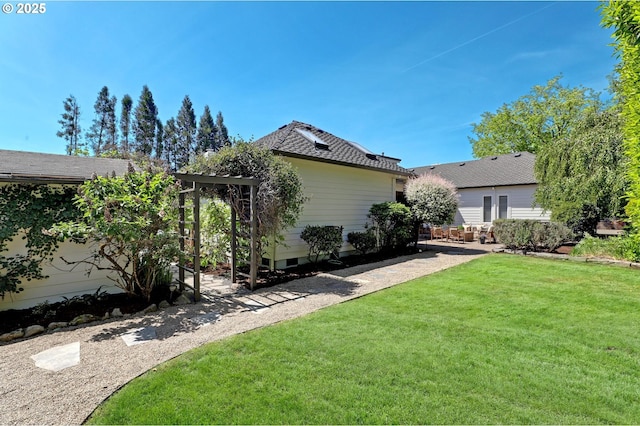 back of house with a yard
