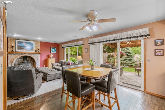 180 NE 29th Dr, Gresham, OR 97030 - dining area with wood finished floors, ceiling fan, and baseboards