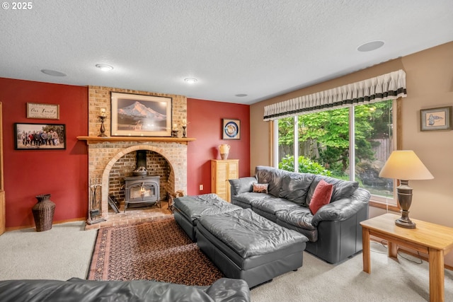 180 NE 29th Dr, Gresham, OR 97030 - carpeted living area featuring a wood stove and a textured ceiling