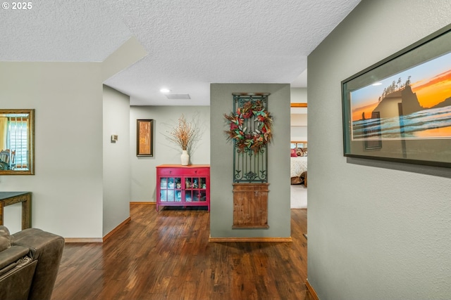 180 NE 29th Dr, Gresham, OR 97030 - corridor featuring baseboards, a textured ceiling, wood finished floors, and recessed lighting