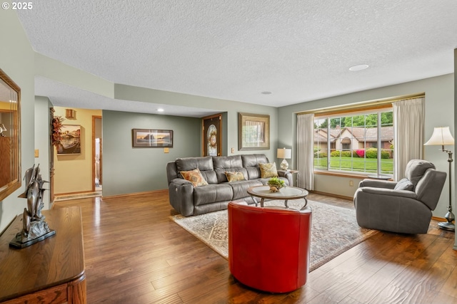 180 NE 29th Dr, Gresham, OR 97030 - living room with a textured ceiling, hardwood / wood-style flooring, baseboards, and recessed lighting