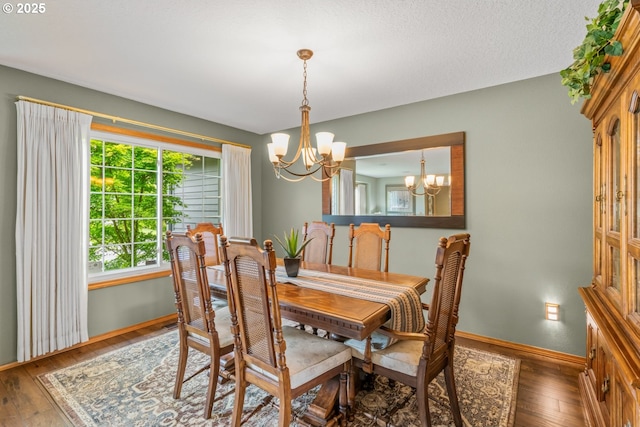 180 NE 29th Dr, Gresham, OR 97030 - dining area with a chandelier, baseboards, and wood finished floors