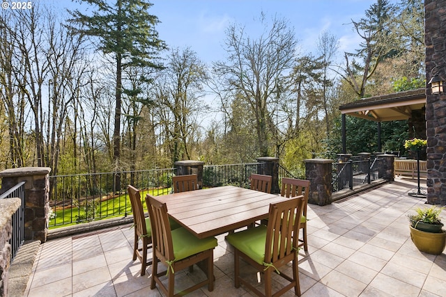 view of patio featuring outdoor dining space