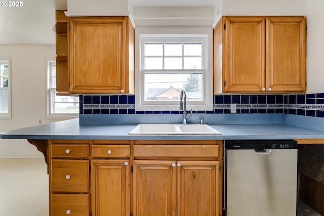 kitchen featuring a sink, open shelves, decorative backsplash, and stainless steel dishwasher