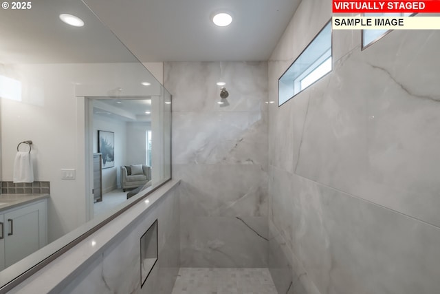 22987 Bland Cir, West Linn, OR 97068 - full bath with a marble finish shower, vanity, and recessed lighting