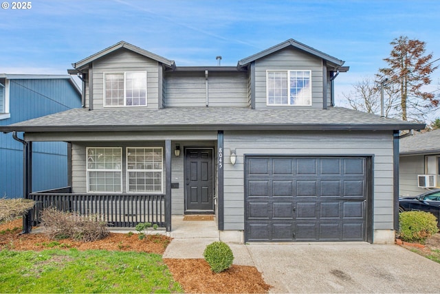 view of front of house with a porch, concrete driveway, an attached garage, and a shingled roof