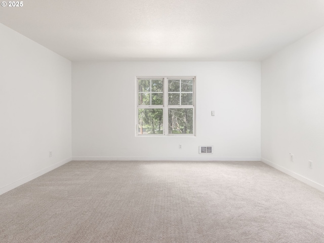 13928 SE Rhone St, Portland, OR 97236 - unfurnished room with light carpet and baseboards