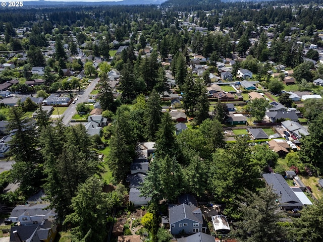 13928 SE Rhone St, Portland, OR 97236 - view of property location with nearby suburban area and a heavily wooded area