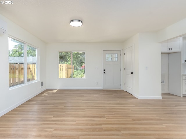 13928 SE Rhone St, Portland, OR 97236 - entrance foyer with baseboards and light wood finished floors