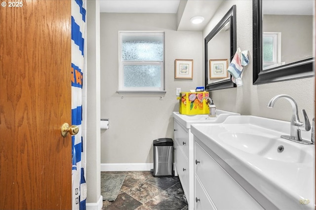 162 Monticello Dr, Longview, WA 98632 - bathroom featuring vanity and stone finish floors