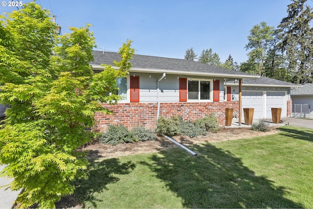 ranch-style house with brick siding, a shingled roof, and an attached garage
