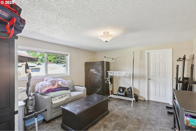 bedroom featuring a textured ceiling