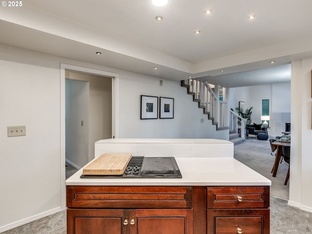 kitchen with light carpet