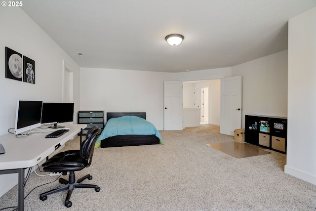 office space with visible vents, baseboards, and carpet floors