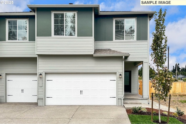 view of front of property with a garage