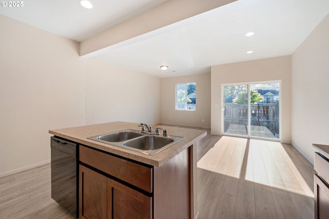 8512 NE 13th Pl, Vancouver, WA 98665 - kitchen featuring black dishwasher, light wood-style floors, an island with sink, recessed lighting, and open floor plan