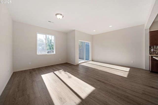 8512 NE 13th Pl, Vancouver, WA 98665 - unfurnished living room with dark wood-style flooring and recessed lighting