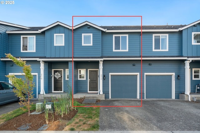 8512 NE 13th Pl, Vancouver, WA 98665 - multi unit property with a garage, board and batten siding, and asphalt driveway