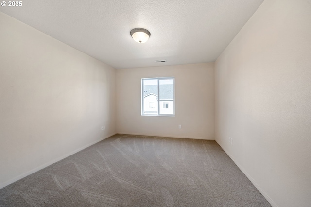 8512 NE 13th Pl, Vancouver, WA 98665 - unfurnished room with carpet and a textured ceiling