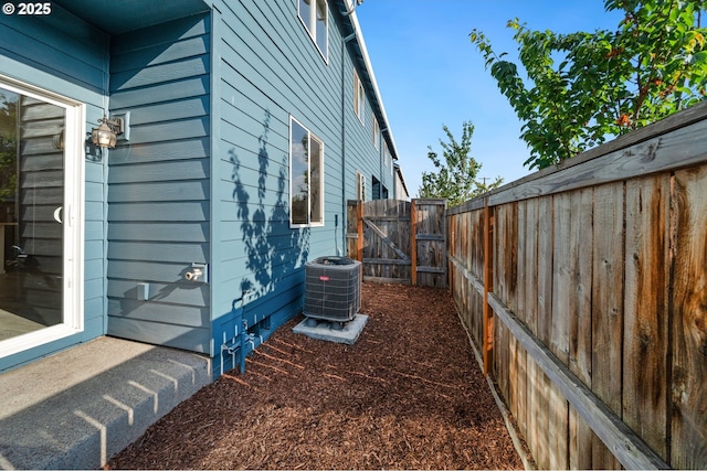 8512 NE 13th Pl, Vancouver, WA 98665 - view of side of property with a gate and a cooling unit