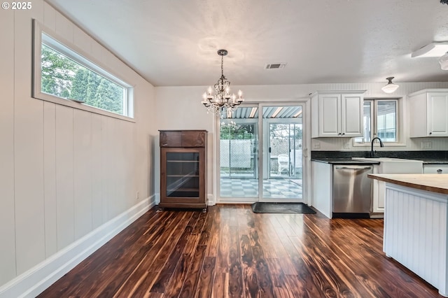 575 NE Fleming Ave Unit B-43, Gresham, OR 97030 - kitchen featuring dishwasher, a sink, dark wood finished floors, white cabinetry, and a chandelier