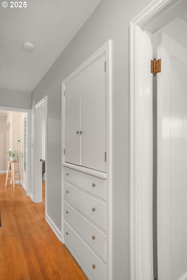 7414 N Chautauqua Blvd, Portland, OR 97217 - hallway with baseboards and light wood-style floors