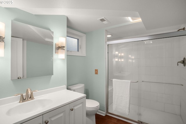 7414 N Chautauqua Blvd, Portland, OR 97217 - full bathroom featuring vanity, a shower stall, and wood finished floors