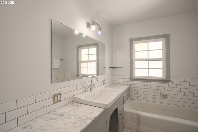 7414 N Chautauqua Blvd, Portland, OR 97217 - bathroom featuring vanity, a bath, and backsplash